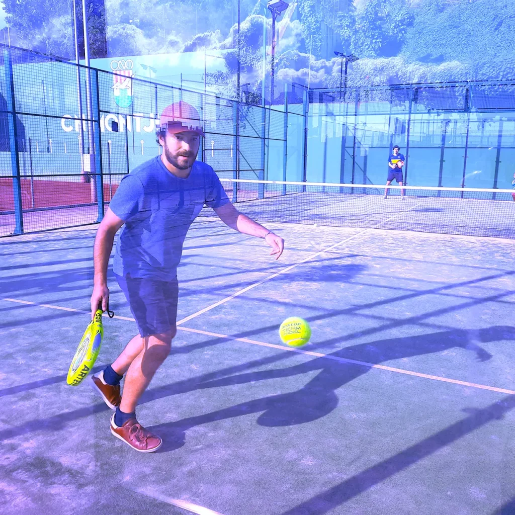 two men competing in a padel match